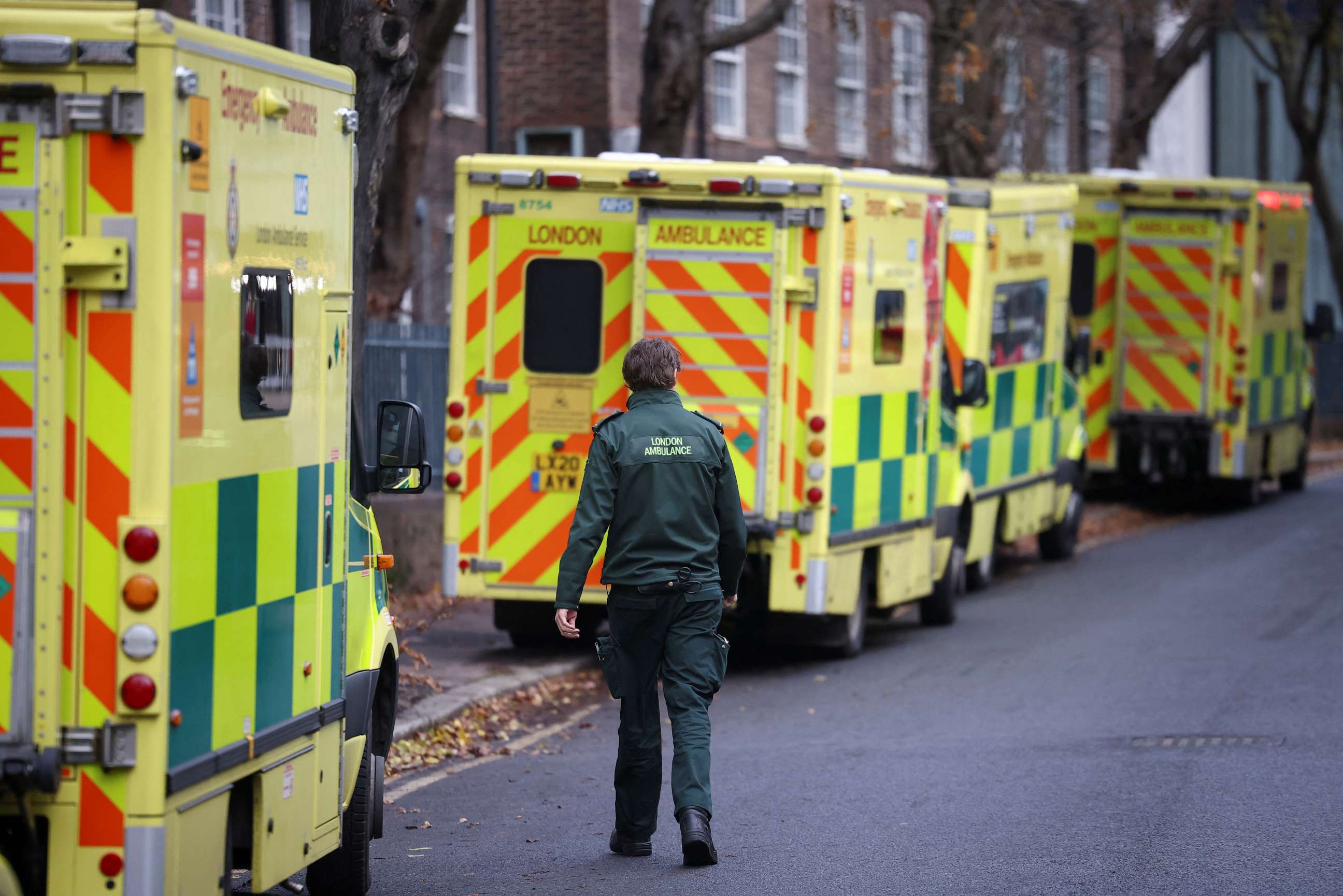 PHOTO: An NHS staff member walks near NHS London Ambulance Service, on the day of a planned strike, amid a dispute with the government over pay, in London, Dec. 21, 2022.