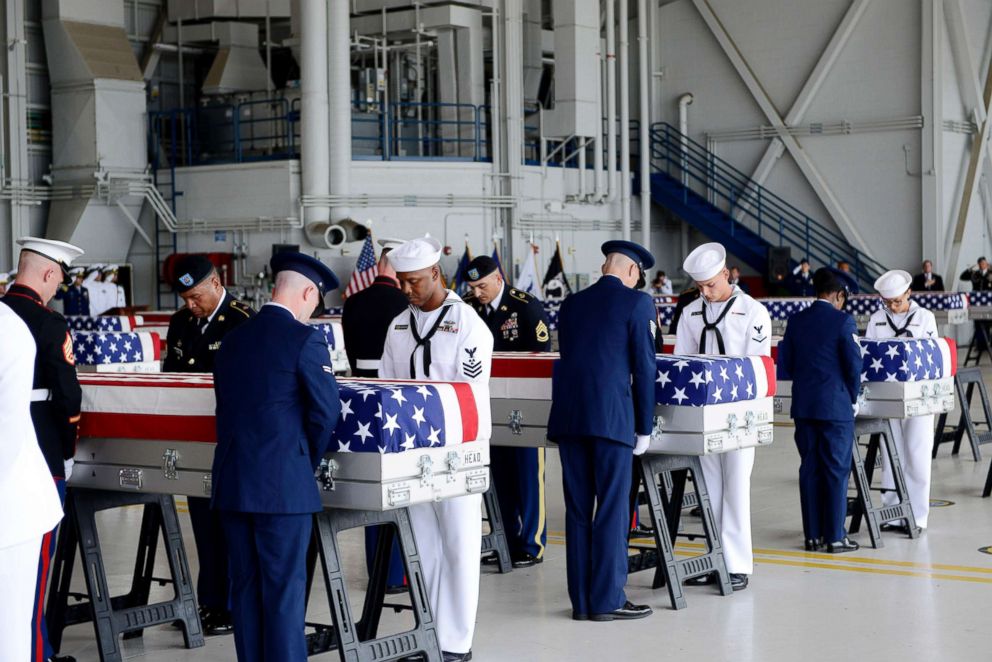 PHOTO: Military honor guards carry the remains of American soldiers repatriated from North Korea during a repatriation ceremony after arriving to Joint Base Pearl Harbor-Hickam, Honolulu, Aug. 1, 2018.