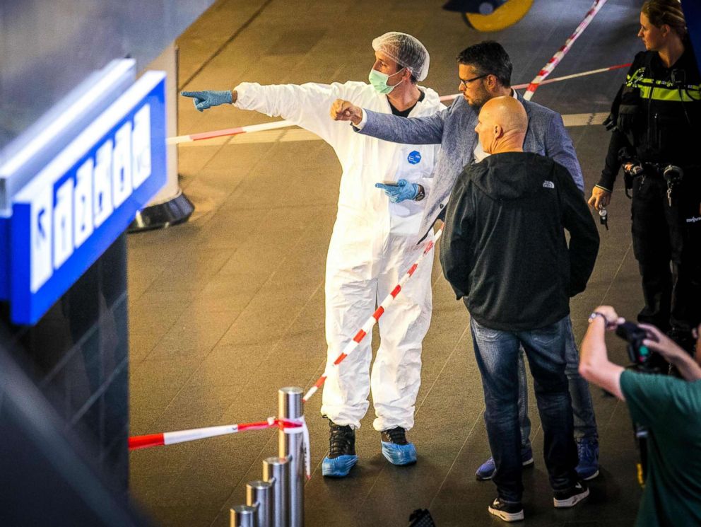 PHOTO: Policemen and forensics are at work after a stabbing incident at the central station in Amsterdam, Aug. 31, 2018.