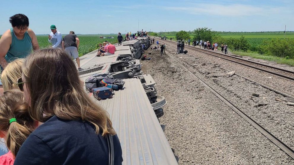 PHOTO: An Amtrak train sits derailed with passengers near Salisbury, Mo., June 27, 2022.