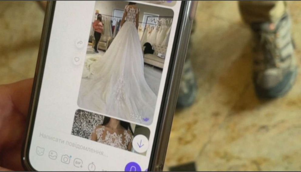 PHOTO: ABC News took a picture of Anastasiia Novitska's phone showing her wedding dress. Novitska was forced to cancel her wedding and flee Ukraine leaving her fiancé behind to fight the Russian invasion, March 4, 2022.