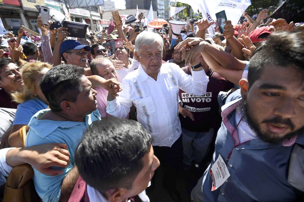 PHOTO: Ahead of the July 1 presidential election, Mexico's presidential candidate for the MORENA party, Andres Manuel Lopez Obrador, greets supporters during a campaign rally in Acapulco, Guerrero State, Mexico, on June 25, 2018.