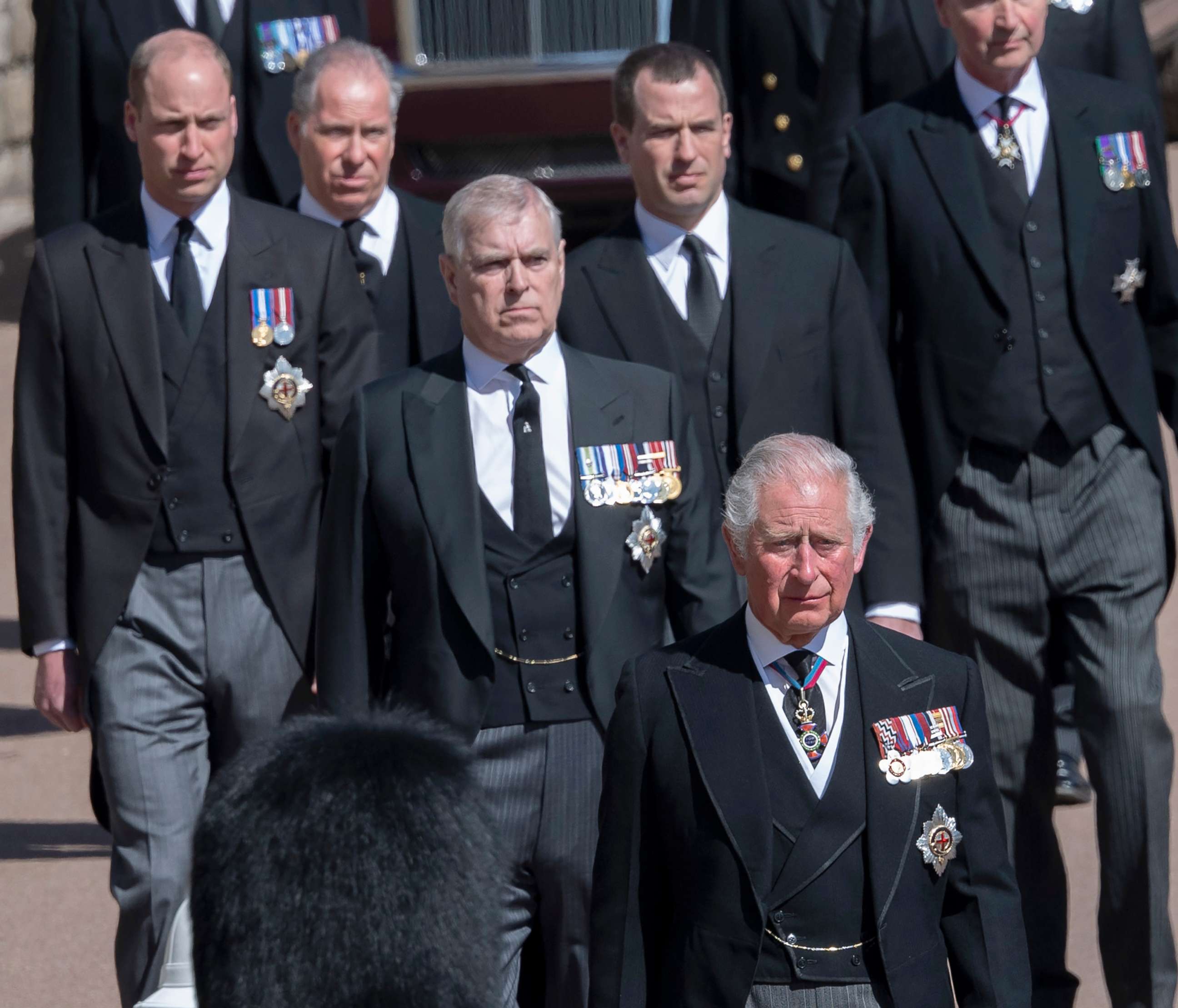 PHOTO: Prince Andrew, Duke of York, follows Prince Charles during the funeral of Prince Philip, April 17, 2021 in Windsor, England, with Prince William behind, left. 