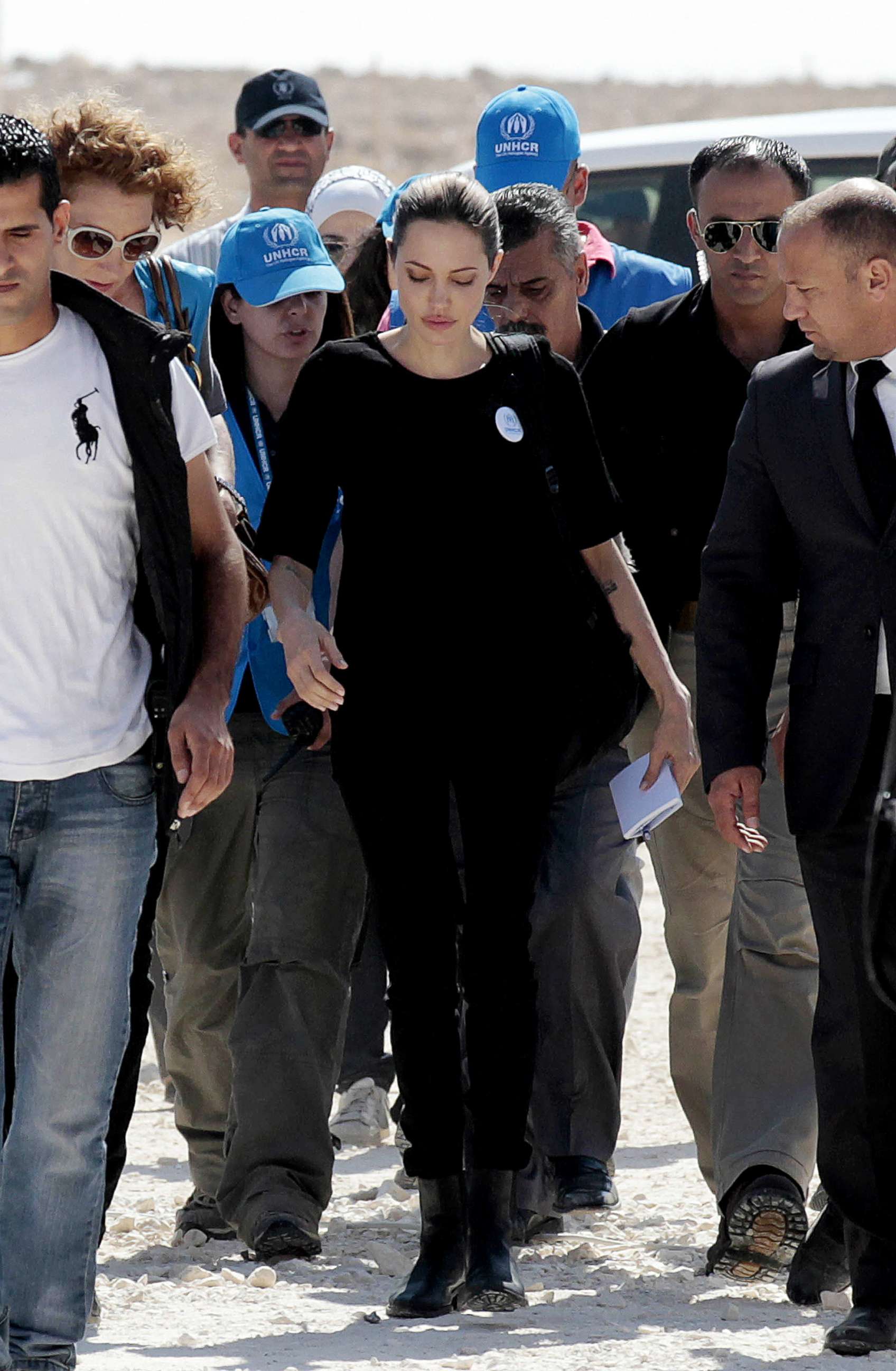 PHOTO: Angelina Jolie and UN High  Commission for Refugees staff visit the Zaatari refugee camp near the Jordanian border with Syria, Sept. 11, 2012.