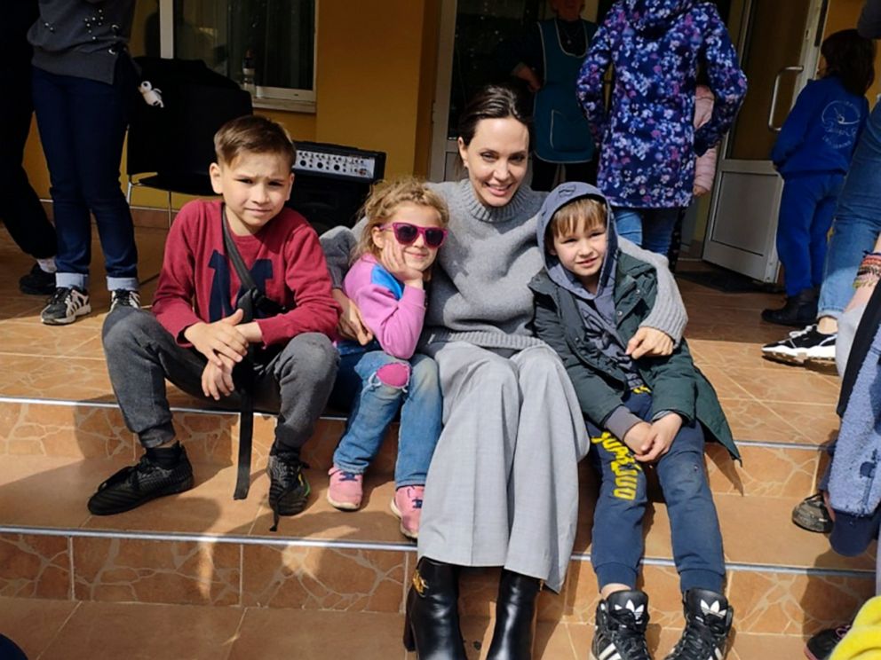 PHOTO: In this image provided by the Lviv city hall Angelina Jolie, Hollywood movie star and UNHCR goodwill ambassador, poses for photo with kids in Lviv, Ukraine, Saturday, Apr. 30, 2022.