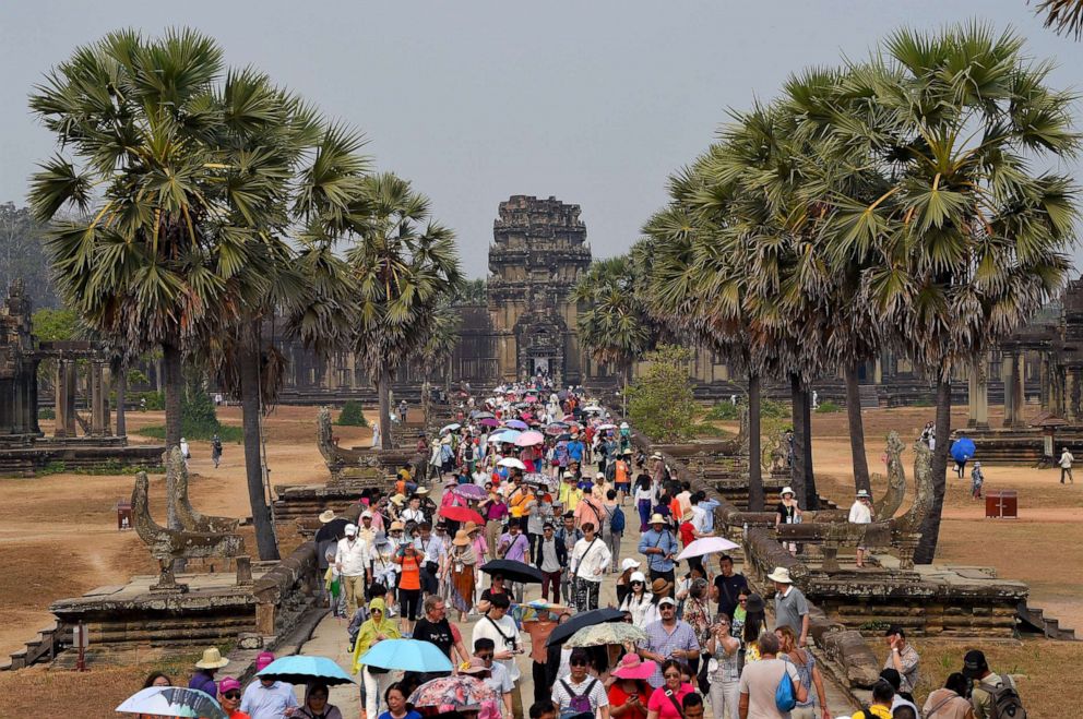 PHOTO: Tourists visit the Angkor Wat temple in Siem Reap province, Cambodia, March 16, 2019.
