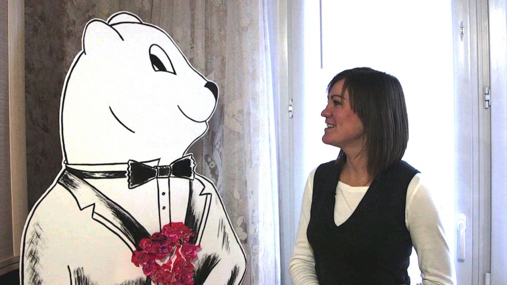 PHOTO: Anna Grandstaff at her home in Moscow with life-sized drawing of Gaylen's bear.