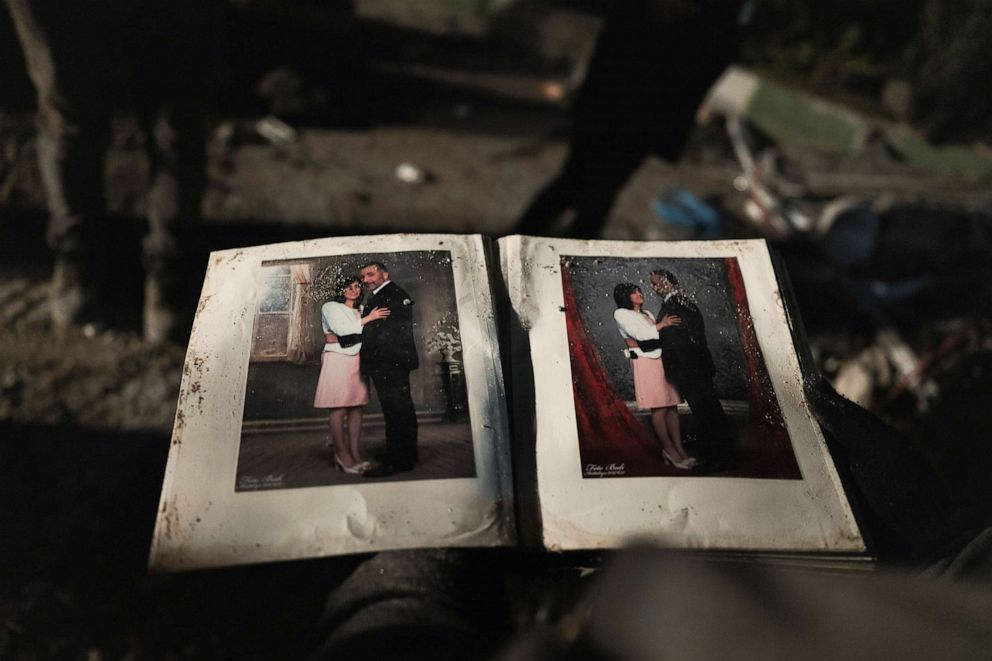 PHOTO: Family photographs are uncovered in the debris of collapsed buildings in Antakya, Turkey, Feb. 8, 2023.