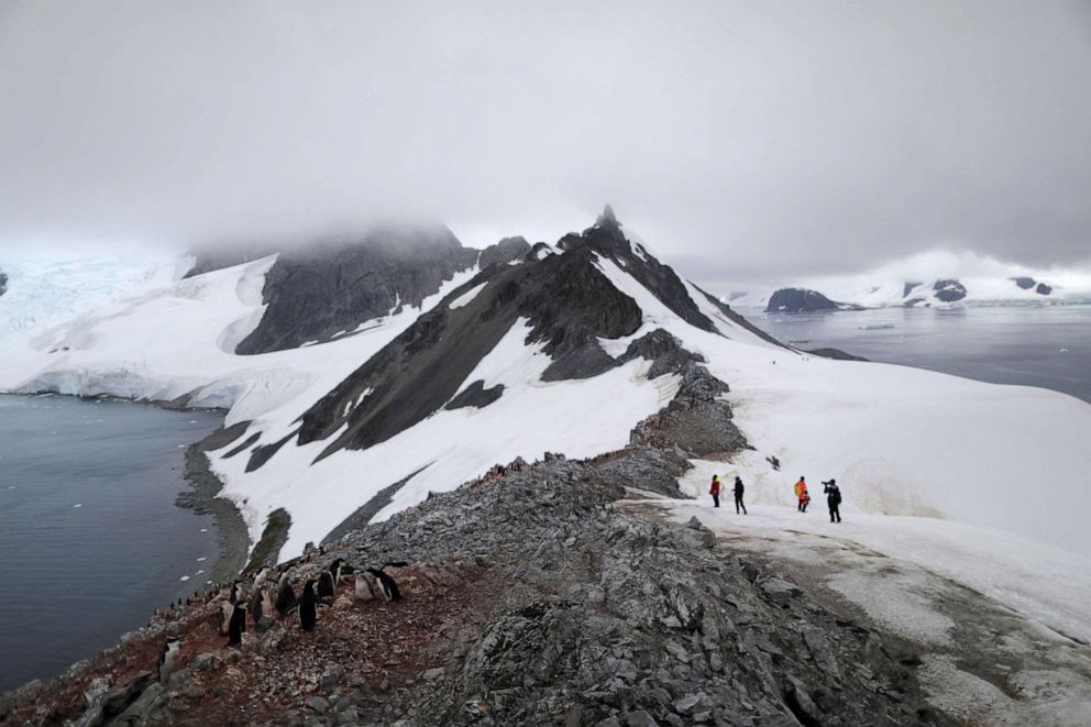 PHOTO: People walk along Orne Harbour, Antarctica, Feb. 6, 2020.