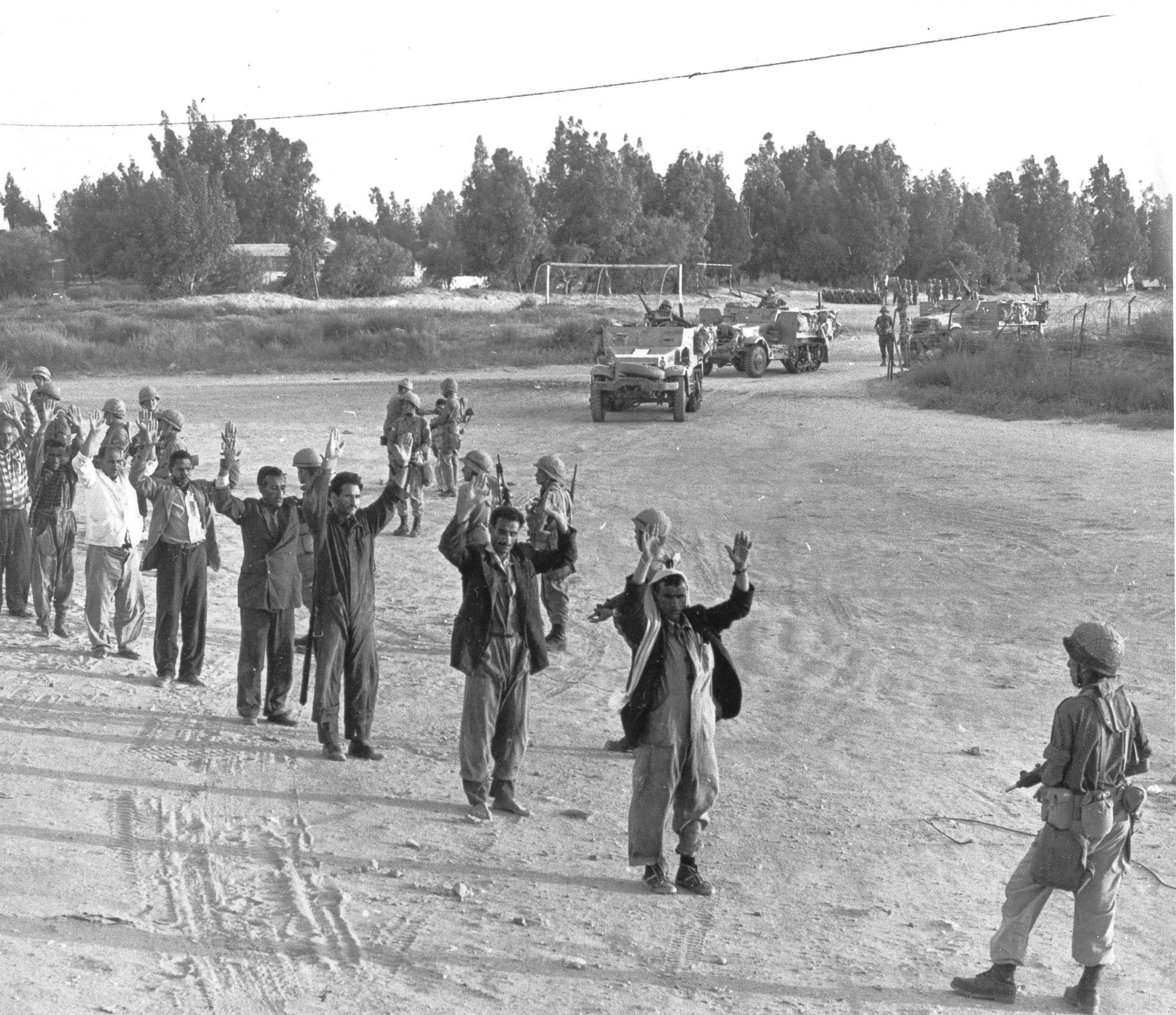 PHOTO: An Israeli soldier lines up captured Egyptian troops to be checked for identification during the Six-Day War, June 6, 1967.