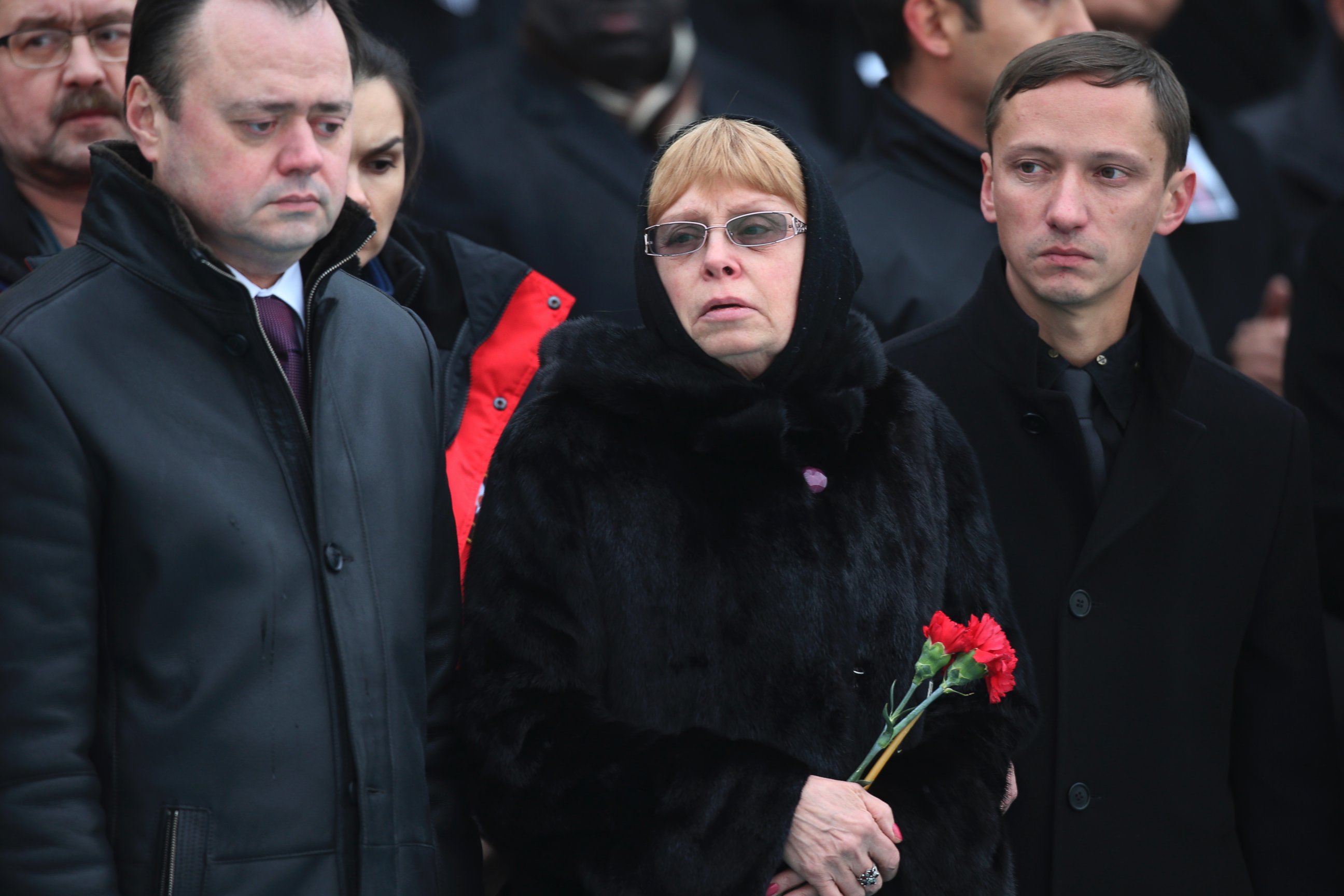 PHOTO: The wife of Russian Ambassador to Turkey, Andrei Karlov, who was assassinated Monday, stands during a ceremony at the airport in Ankara, Turkey, Dec. 20, 2016.