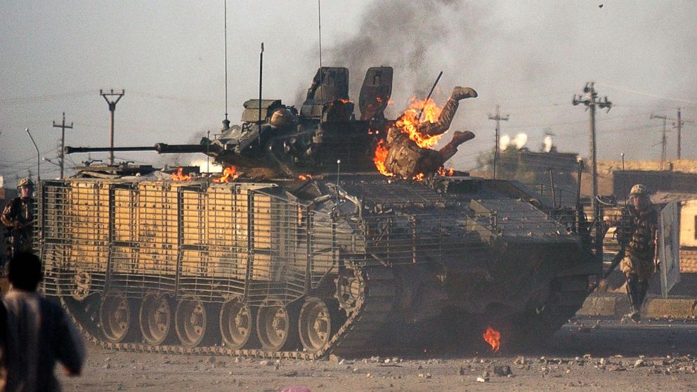 PHOTO: A British soldier makes his way out of a burning Warrior fighting vehicle in Basra, southeast of Baghdad, Sept. 19, 2005. 