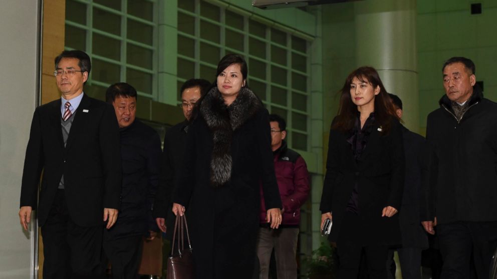 North Korean Hyon Song Wol, center, the leader of Pyongyang's all-female Moranbong Band, leaves for North Korea at the Inter-Korean Transit Office in Paju, South Korea, Monday, Jan. 22, 2018. 