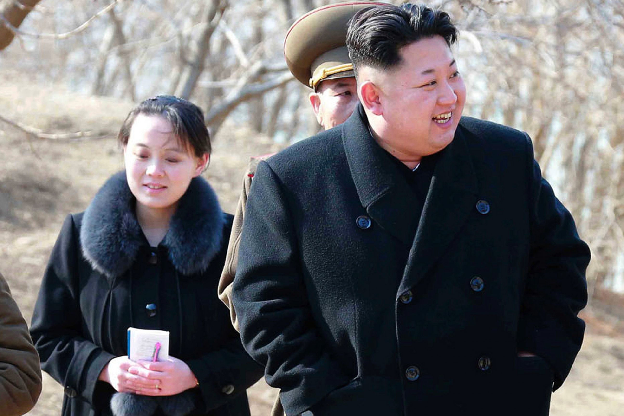 This 2015 file photo provided by the North Korean government shows North Korean leader Kim Jong Un and his sister Kim Yo Jong, left, during their visit to a military unit in North Korea.