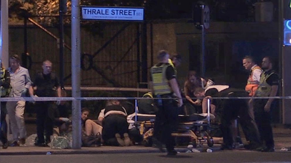 PHOTO: In this image made from PA Video footage, people receive medical attention in Thrale Street near London Bridge following a terrorist incident Saturday, June 3, 2017.