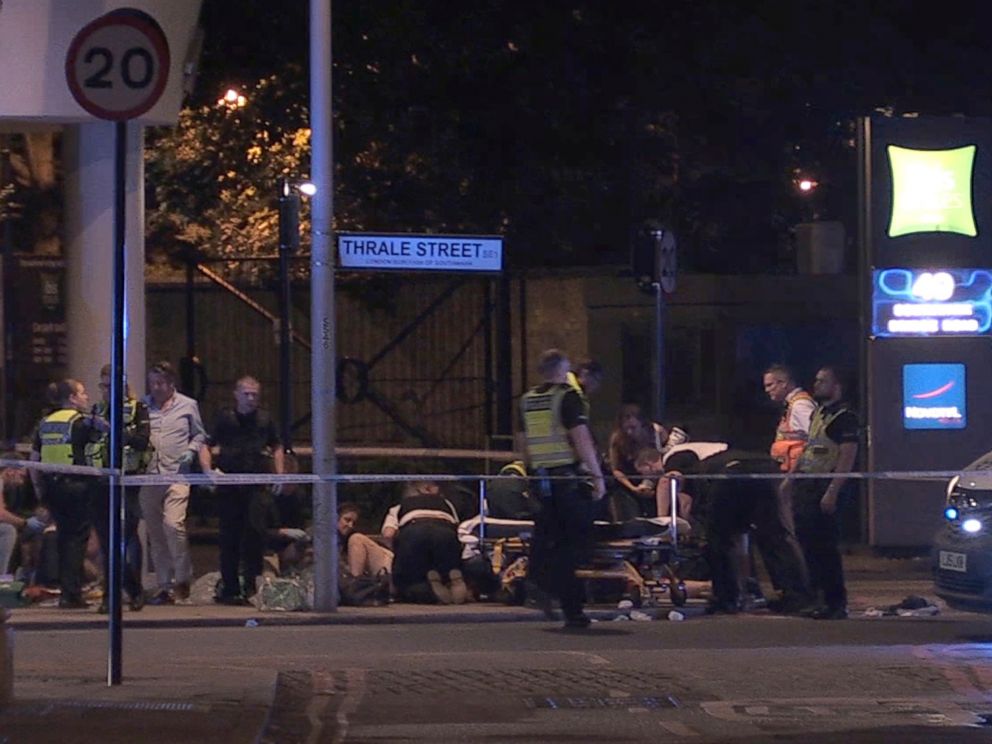 PHOTO: In this image made from PA Video footage, people receive medical attention in Thrale Street near London Bridge following a terrorist incident Saturday, June 3, 2017.