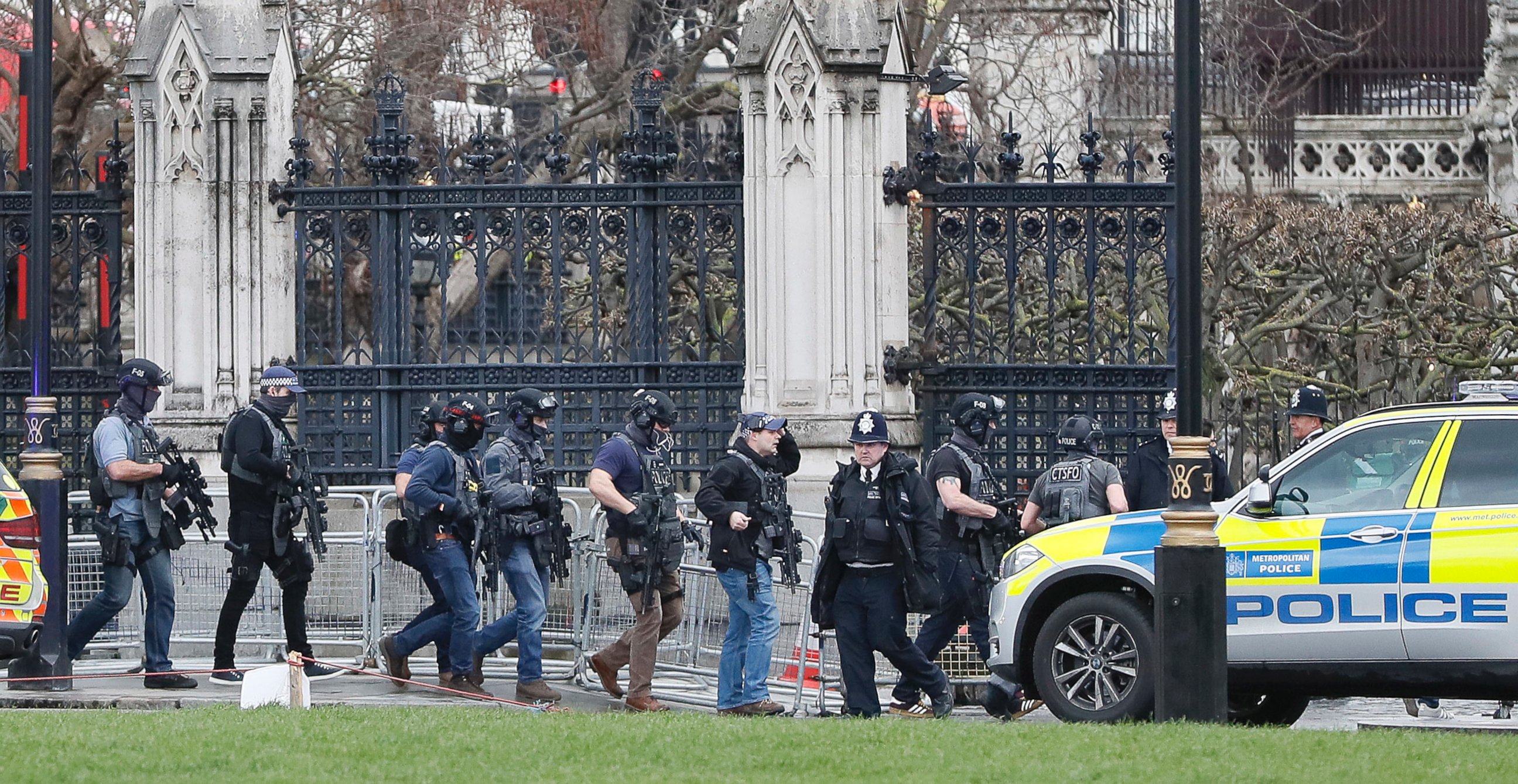 PHOTO: Armed police officers enter the Houses of Parliament in London, March 23, 2017 after the House of Commons sitting was suspended as witnesses reported sounds like gunfire outside.