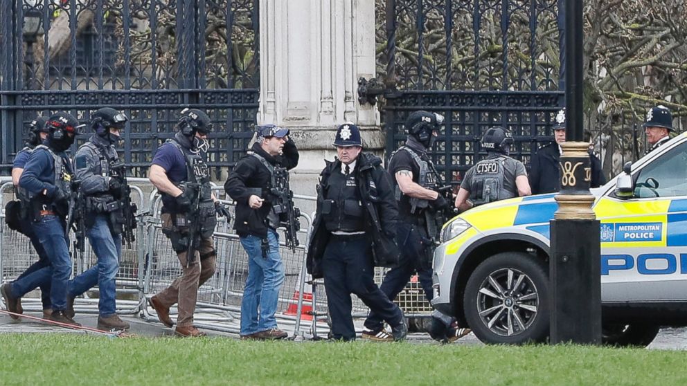 PHOTO: Armed police officers enter the Houses of Parliament in London, March 23, 2017 after the House of Commons sitting was suspended as witnesses reported sounds like gunfire outside.