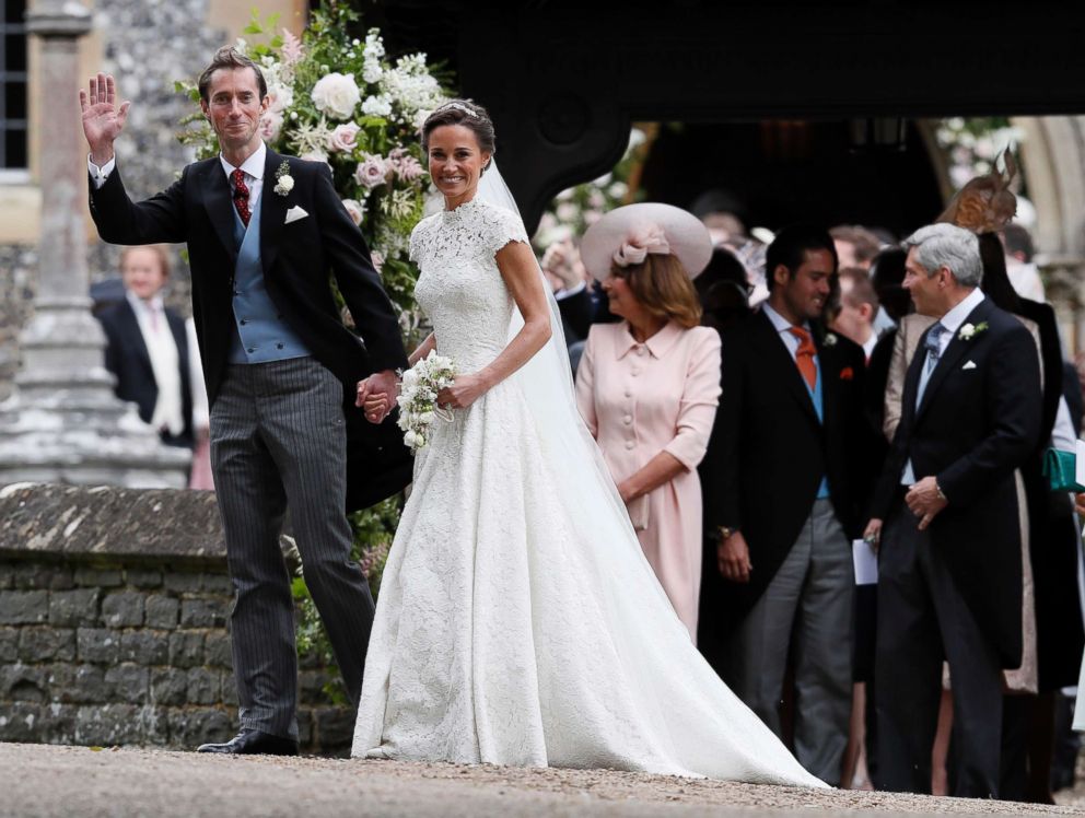 PHOTO: Pippa Middleton and James Matthews smile for the cameras after their wedding at St Mark's Church in Englefield, England, May 20, 2017.