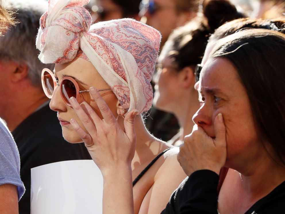 PHOTO: People attend a vigil in Albert Square, Manchester, England, May 23, 2017, the day after the suicide attack at an Ariana Grande concert that left 22 people dead as it ended on Monday night.