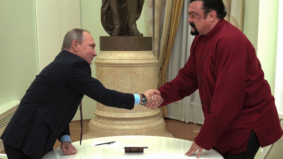 Steven Seagal Receives Russian Passport Direct From Putin ...