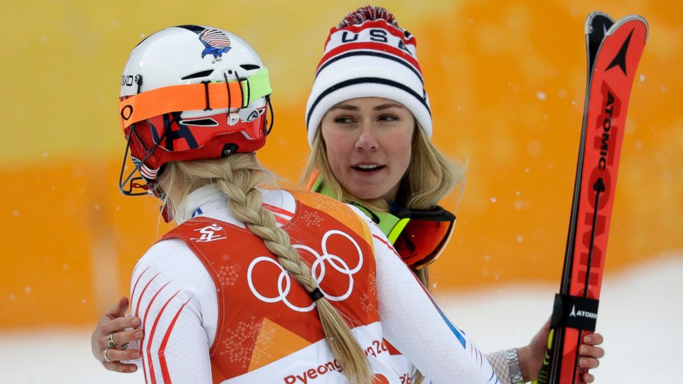 Mikaela Shiffrin, of the United States, right, hugs compatriot Lindsey Vonn after the women's combined slalom at the 2018 Winter Olympics in Jeongseon, South Korea, Thursday, Feb. 22, 2018. 