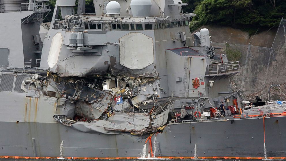 PHOTO: The damaged side of USS Fitzgerald at the U.S. Naval base in Yokosuka, southwest of Tokyo, June 18, 2017.  