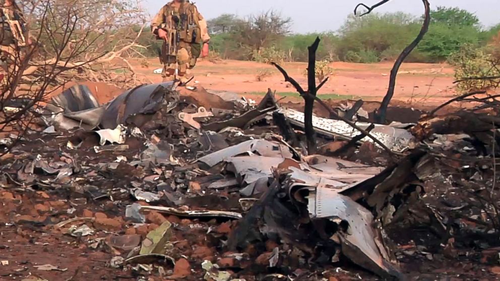PHOTO: This photo provided on July 25, 2014 by the French army shows soldiers at the site of the plane crash in Mali. 