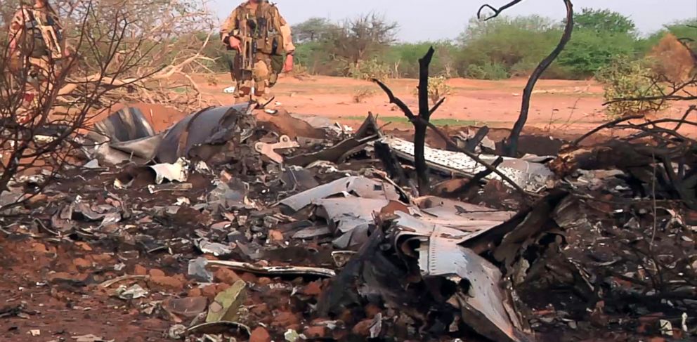 PHOTO: This photo provided on July 25, 2014 by the French army shows soldiers at the site of the plane crash in Mali. 