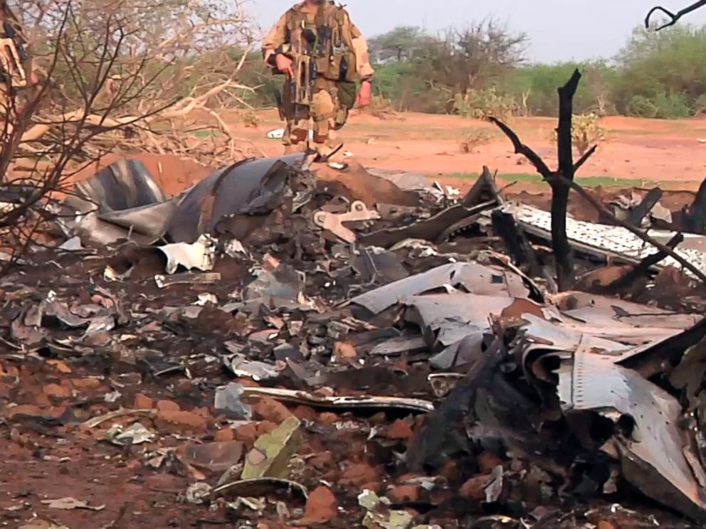 PHOTO: This photo provided on July 25, 2014 by the French army shows soldiers at the site of the plane crash in Mali.