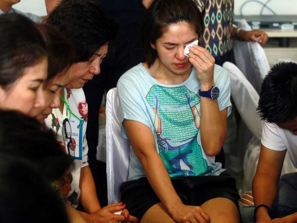 PHOTO: Relatives of passengers of the missing AirAsia flight QZ8501 wait at the crisis center at Juanda International Airport in Surabaya, Indonesia, Dec. 30, 2014.