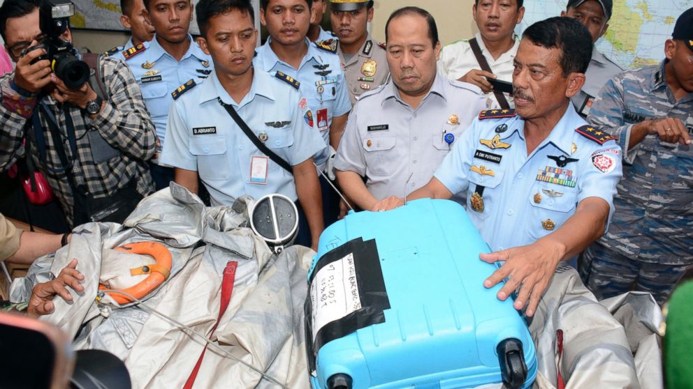 PHOTO: Indonesian Air Force officials show AirAsia Flight 8501 debris during a press conference at the airbase in Pangkalan Bun, Central Borneo, Indonesia, Dec. 30, 2014.