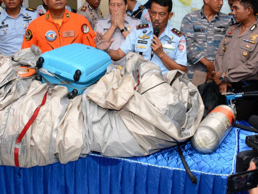 PHOTO: Indonesian Air Force officials show AirAsia Flight 8501 debris during a press conference at the airbase in Pangkalan Bun, Central Borneo, Indonesia, Dec. 30, 2014. 