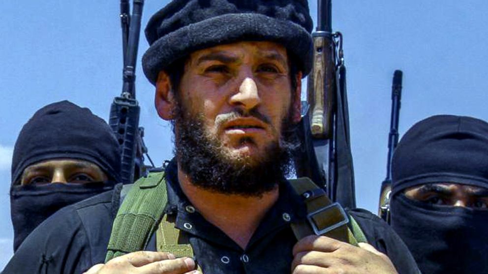 This undated image posted by supporters of the Islamic State group, shows Abu Muhammed al-Adnani, ISIS's spokesman and chief strategist, who laid out the blueprint for the extremist group's attacks against the West. 