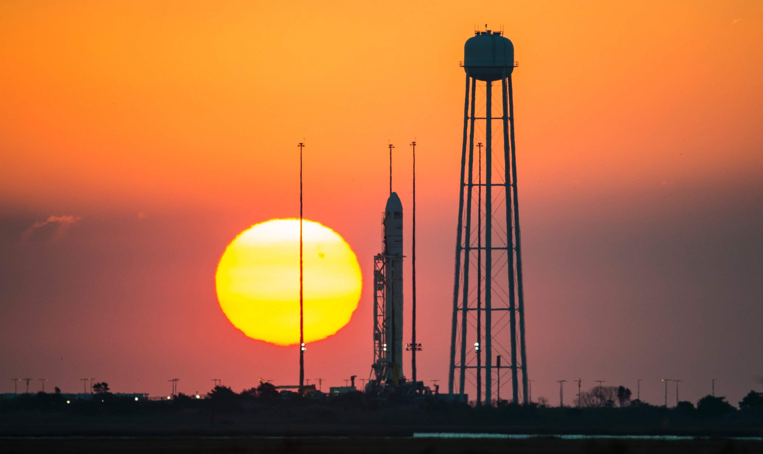 PHOTO: In this photo provided by NASA, the Orbital Sciences Corporation Antares rocket, with the Cygnus spacecraft onboard, is seen during sunrise, Oct. 26, 2014, at NASA's Wallops Flight Facility in Virginia. 
