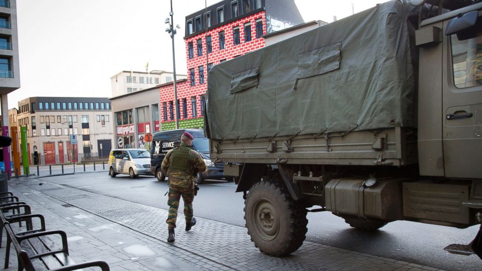 Belgian para-commando's patrol near the central train station in Antwerp, Belgium, on Jan. 17, 2015. Armed soldiers fanned out to guard possible terror targets across Belgium as authorities rushed to thwart more attacks by people with links to Mideast Islamic extremists, a day after anti-terror raids netted dozens of suspects across Western Europe.