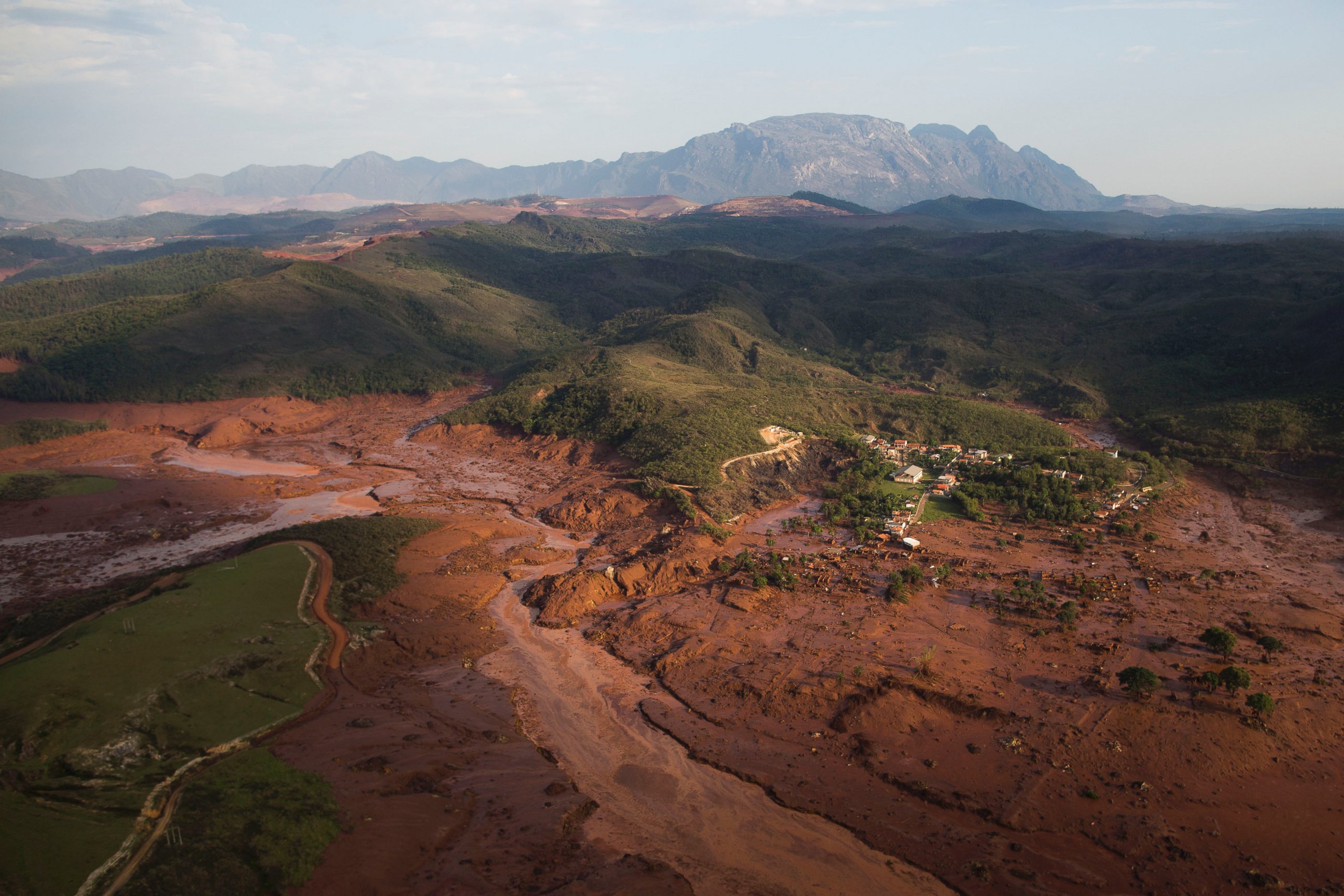 PHOTO: An aerial view shows the debris and mud covering the small town of Bento Rodrigues after two dams burst in Minas Gerais state, Brazil, Nov. 6, 2015.