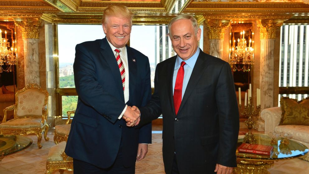 In this handout photo made on Sunday, Sept. 25, 2016, provided by the Israeli Government Press Office, Republican Presidential candidate Donald Trump shakes hand with Israeli Prime Minister Benjamin Netanyahu in New York. 