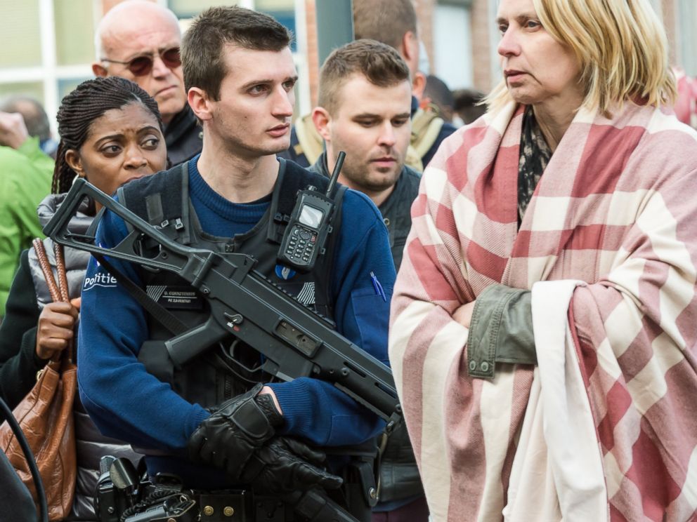 PHOTO: A police officer stands guard as people are evacuated from Brussels airport, after explosions rocked the facility in Brussels, Belgium, Tuesday March 22, 2016.
