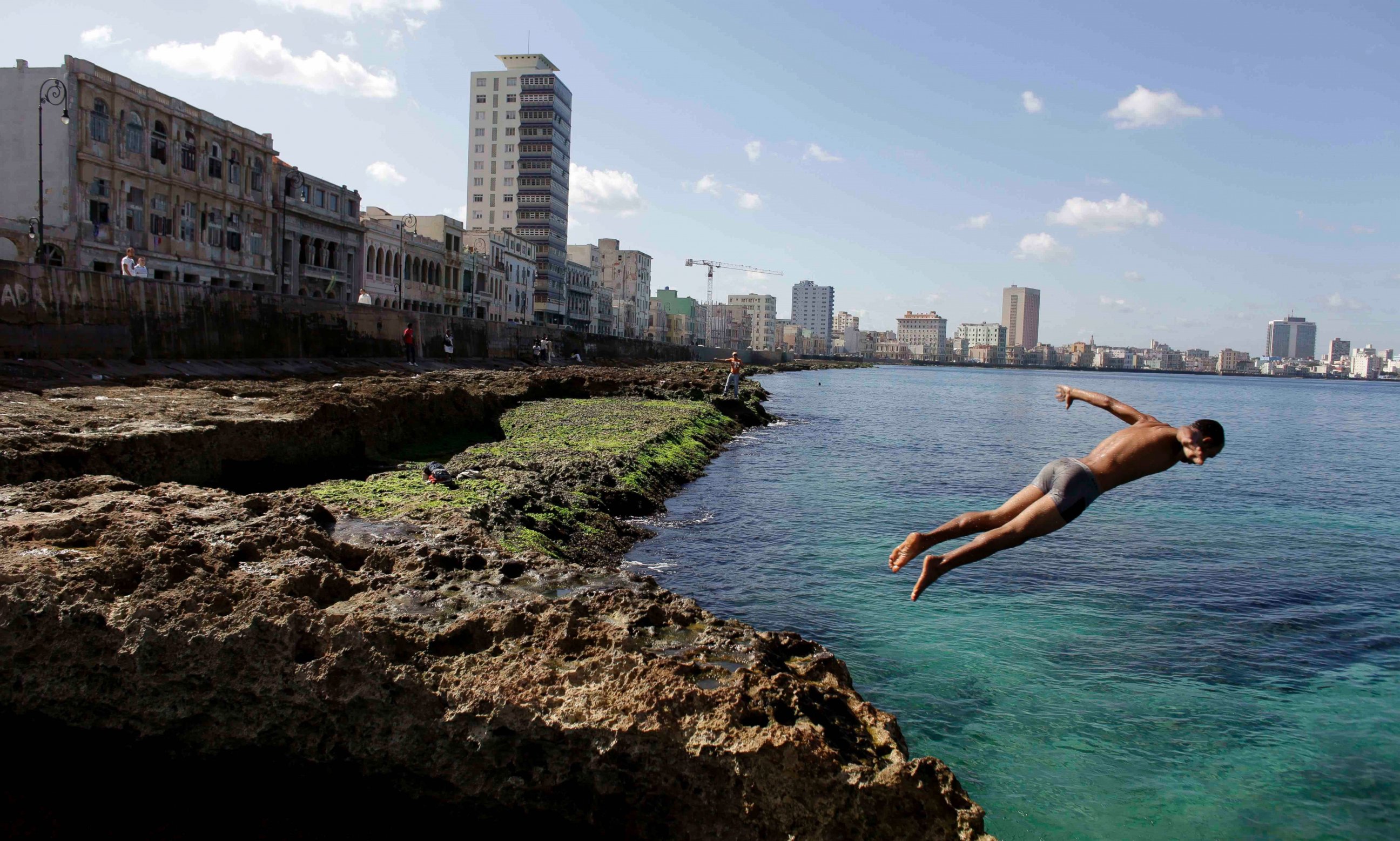 PHOTO: In this Nov. 28, 2011, file photo, a boy jumps into the water at the Malecon in Havana, Cuba.
