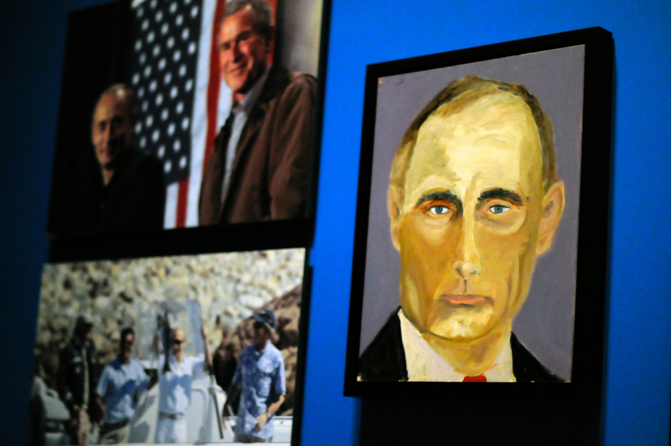 PHOTO: A portrait of Russian President Vladimir Putin which is part of the exhibit "The Art of Leadership: A President's Diplomacy," are on display at the George W. Bush Presidential Library and Museum in Dallas, April 4, 2014.