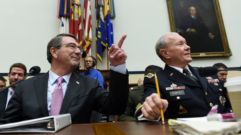 Defense Secretary Ash Carter, left, and Joint Chiefs Chairman Gen. Martin Dempsey, prepare to testify on Capitol Hill in Washington, June 17, 2015.
