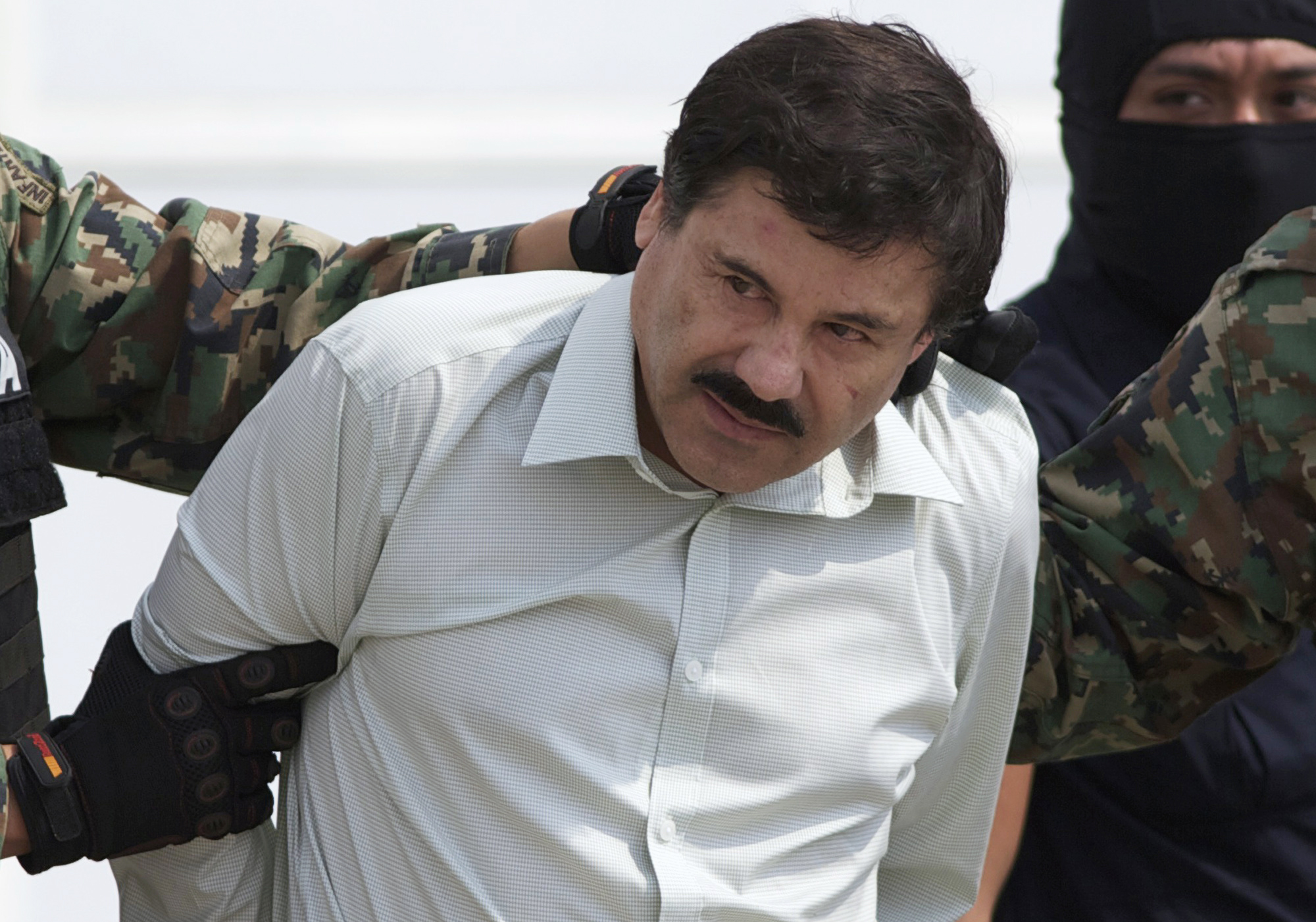 PHOTO: In this Feb. 22, 2014, file photo, Joaquin "El Chapo" Guzman, head of Mexico?s Sinaloa Cartel, is seen in custody in Mexico City following his capture in the beach resort town of Mazatlan.