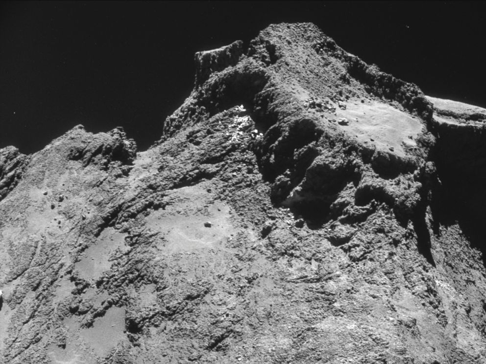 PHOTO: The picture taken with the navigation camera on Rosetta and released by the European Space Agency ESA shows a raised plateau on the larger lobe of Comet 67P/Churyumov?Gerasimenko.