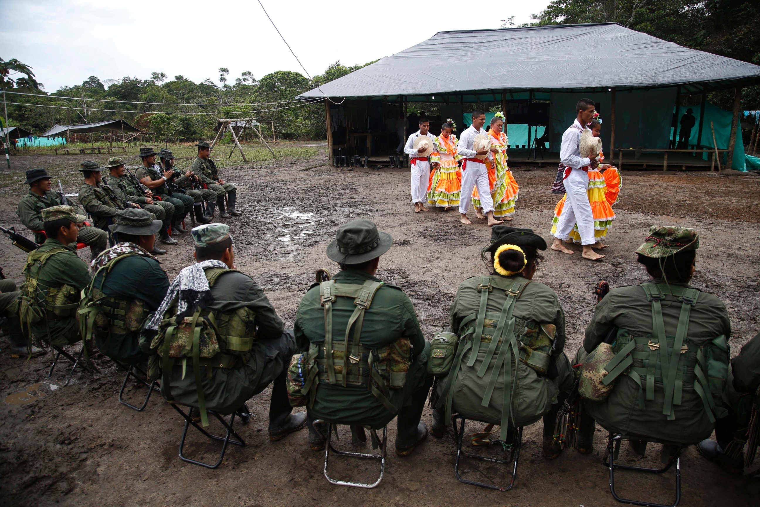 PHOTO: Rebels of the the 32nd Front of the Revolutionary Armed Forces of Colombia perform folk dances in front of their comrades at their camp in the southern jungles of Putumayo, Colombia, Aug. 11, 2016.