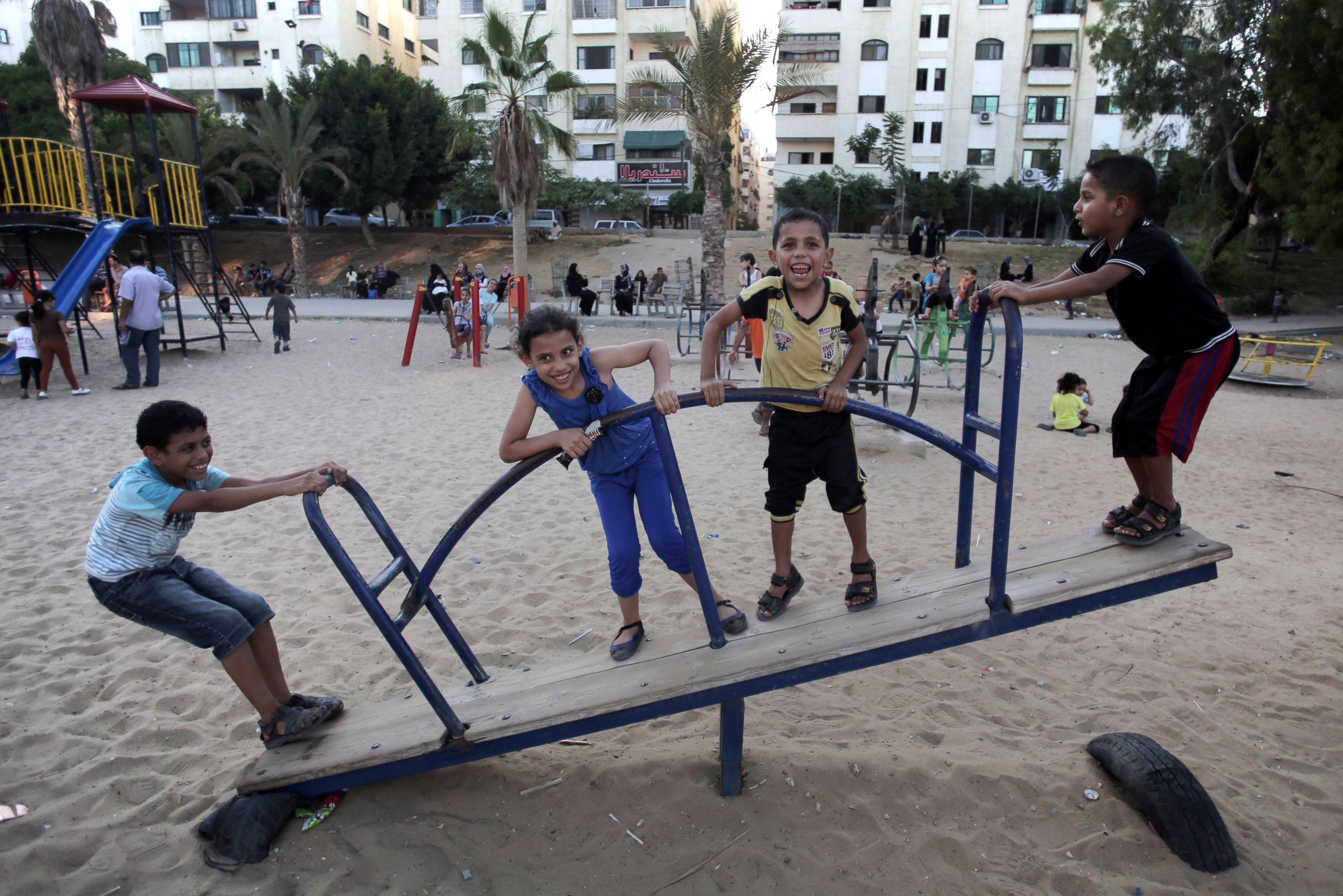 PHOTO: Palestinian children play in a public park during a temporary Hamas and Israel cease fire in Gaza City, Aug. 5, 2014. 