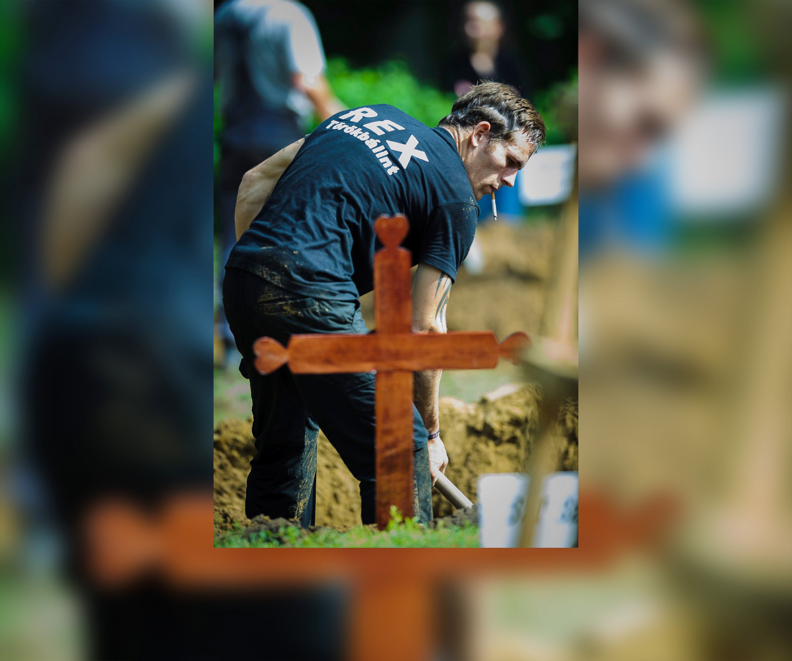 PHOTO: A gravedigger competes during the first National Grave Digging Competition at the public cemetery of Debrecen, Hungary, June 3, 2016. 