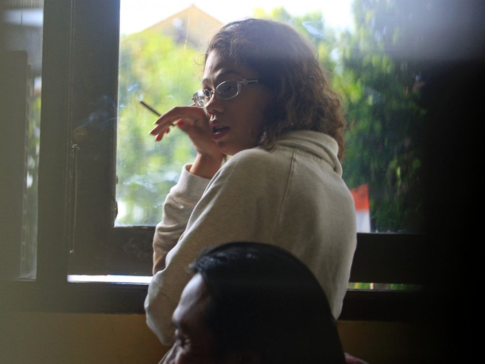 PHOTO: Heather Mack, stands at the police district headquarters after she was brought in for questioning in relation to the death of her mother, in Bali, Indonesia,  Aug. 14, 2014. 