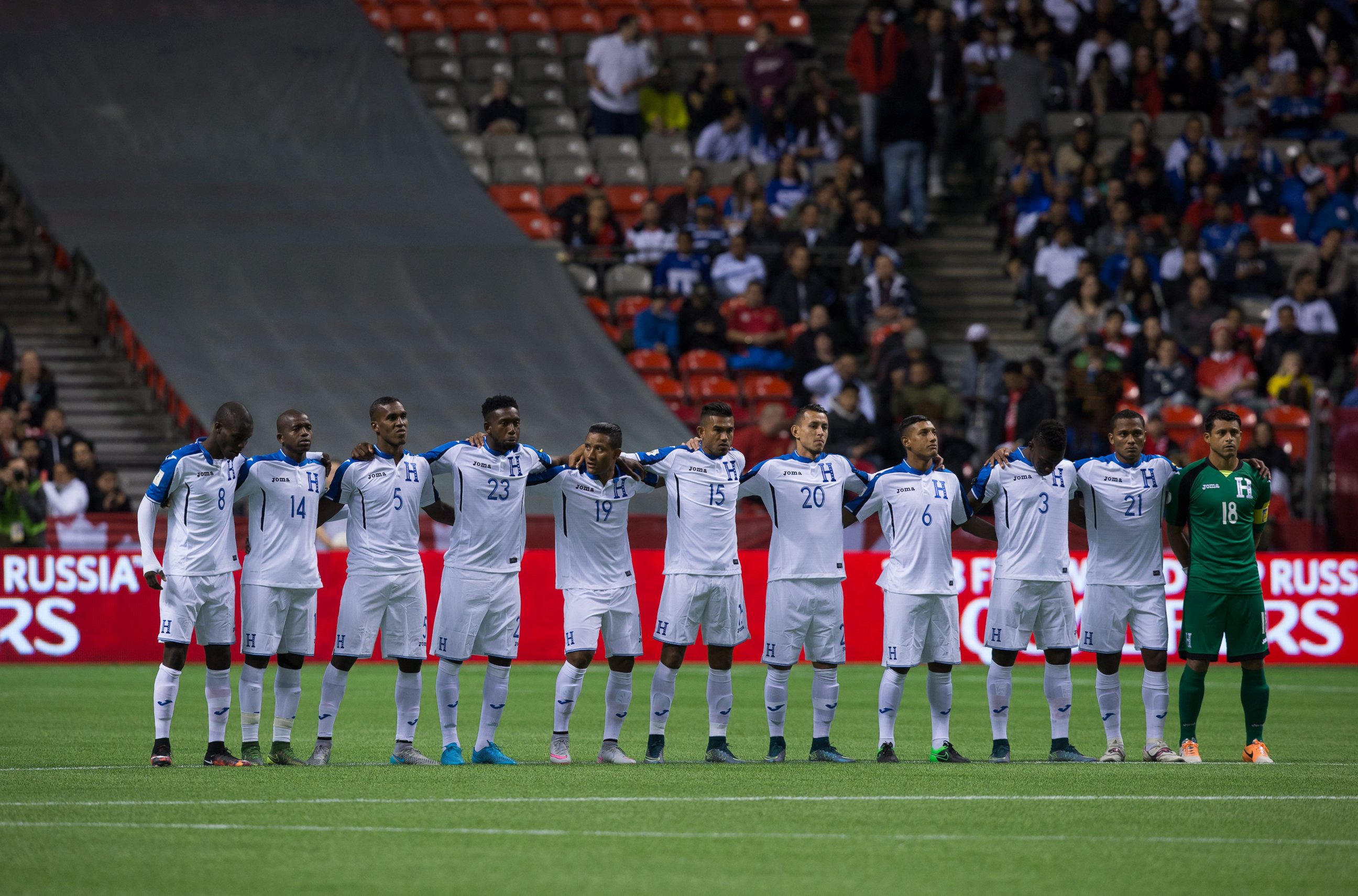 PHOTO: Honduras players stand during a moment of silence to honor the victims of the Paris terrorist attack before playing Canada in a 2018 World Cup qualifying soccer match in Vancouver on Nov. 13, 2015. 