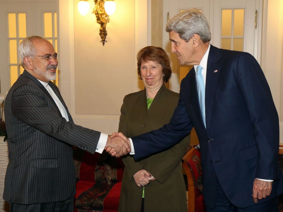 PHOTO: Iranian Foreign Minister Mohammad Javad Zarif shakes hands with U.S. Secretary of State John Kerry as former EU foreign policy chief Catherine Ashton looks prior to closed-door nuclear talks with Iran in Vienna, Austria, Nov. 20, 2014.